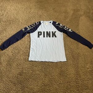 Ladies “PINK” long sleeve sequin accent top. Light blue w/navy sleeves Sz Small